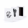 Black handprint and footprint with ink pad