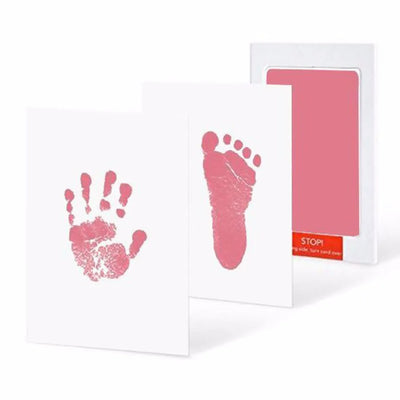 Pink handprint and footprint with ink pad