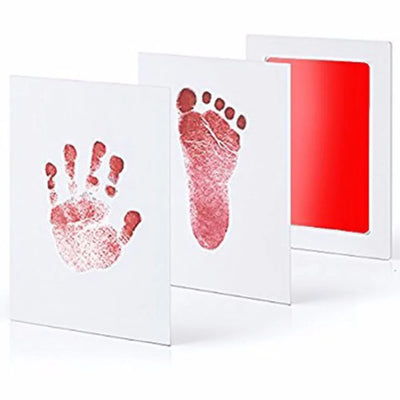 Red handprint and footprint with ink pad