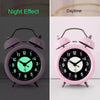 Pink retro twin bell alarm clock with night effect