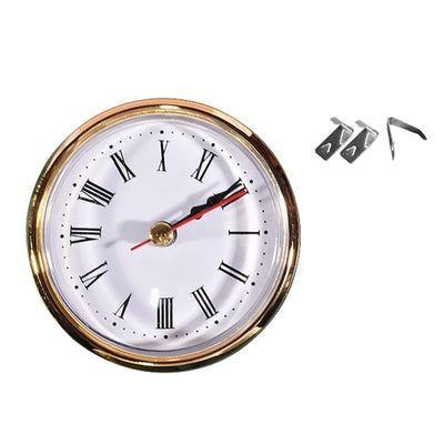 Clock face with gold rim and metal clips.