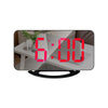 Red LED display on digital alarm clock