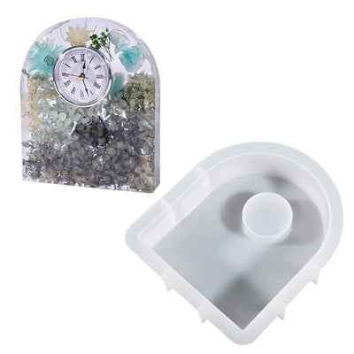 Arch-shaped resin clock with floral design and mold.