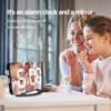 Mirror alarm clock with mother and daughter using makeup