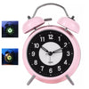 Pink retro twin bell alarm clock with luminous dial