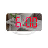 Red LED display on digital alarm clock