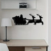 Christmas sleigh wall art above office desk